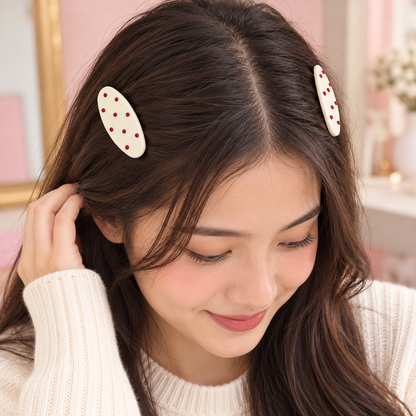 Oval polka dot hair clips in assorted colours
