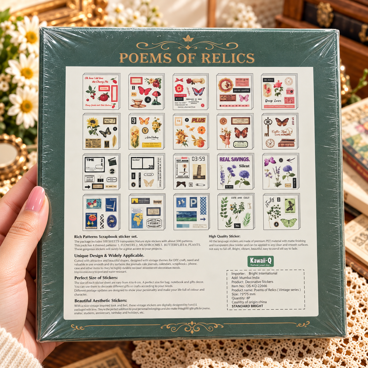 Front of Poems of Relics Narrative Poetry vintage scrapbook sticker set in dark green box with butterflies and flowers