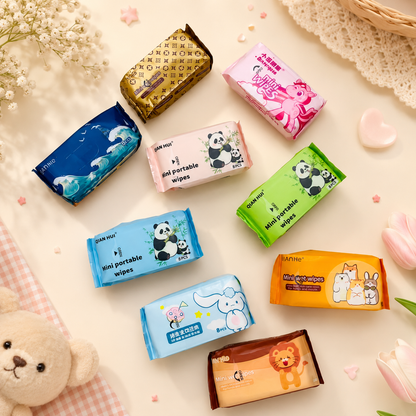 Mini wet wipes packs displayed with 8 individual wipes laid out in front