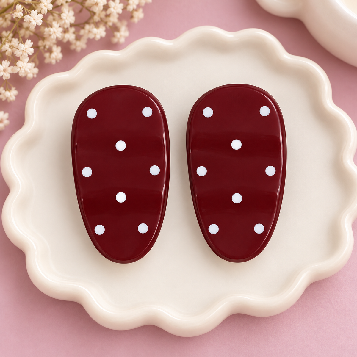 Pair of bright pink oval hair clips